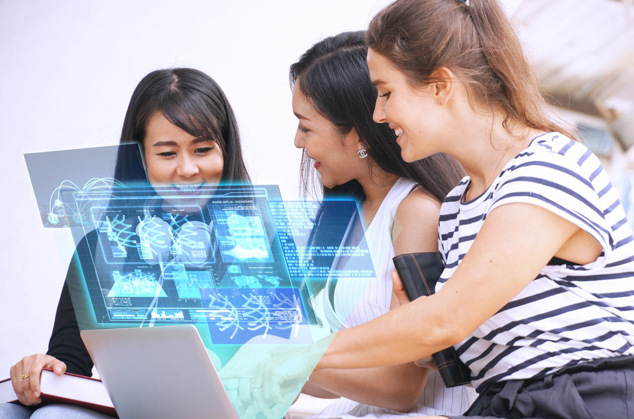 Tree women sitting together and searching with A.I. from laptop, futuristic concept.